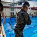 Martial arts instructor hopefuls complete pool workout