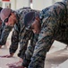 Martial arts instructor hopefuls complete pool workout