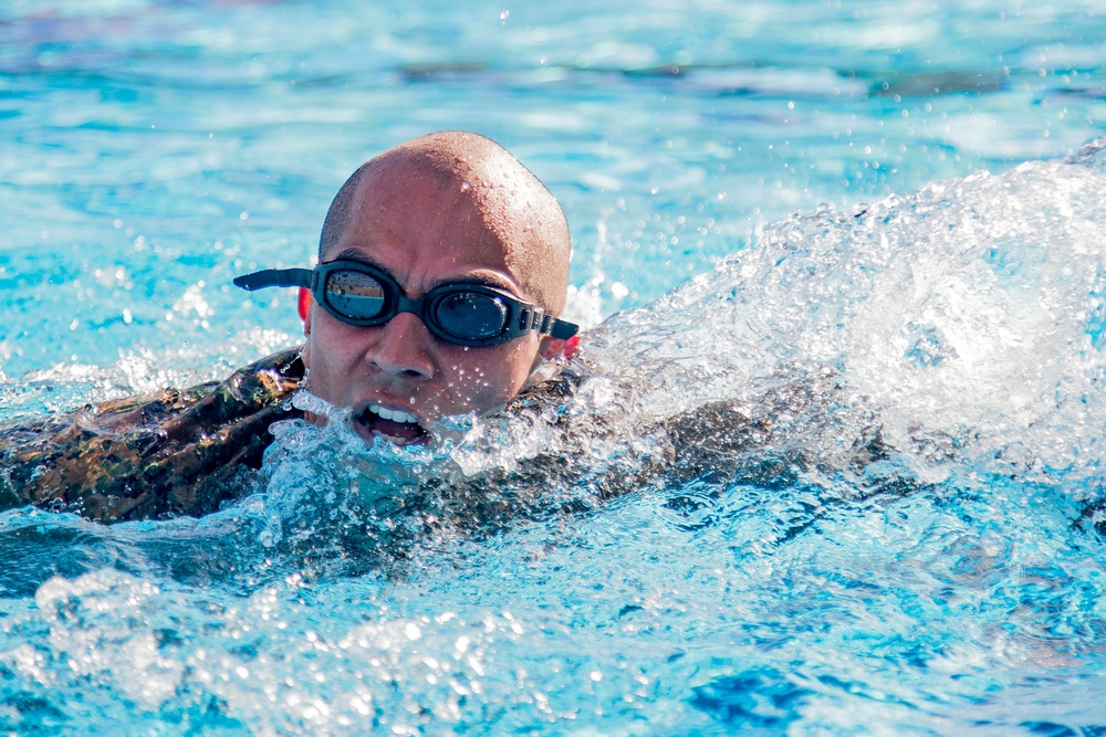 Martial arts instructor hopefuls complete pool workout