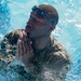 Martial arts instructor hopefuls complete pool workout