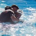 Martial arts instructor hopefuls complete pool workout