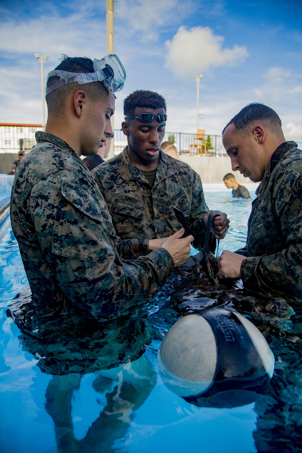 Martial arts instructor hopefuls complete pool workout