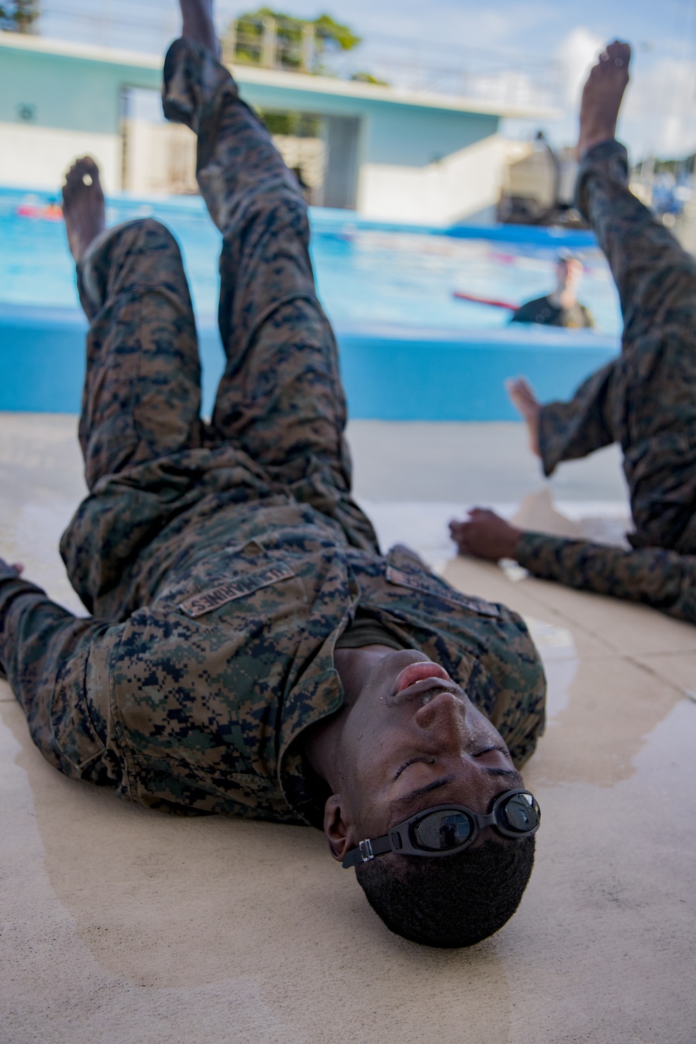 Martial arts instructor hopefuls complete pool workout