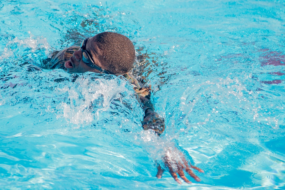 Martial arts instructor hopefuls complete pool workout