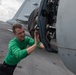 U.S. Navy Aviation Electronics Technician 3rd Class Henry Metzler, from Menifee, California, replaces the radar power supply of an F/A-18 Super Hornet
