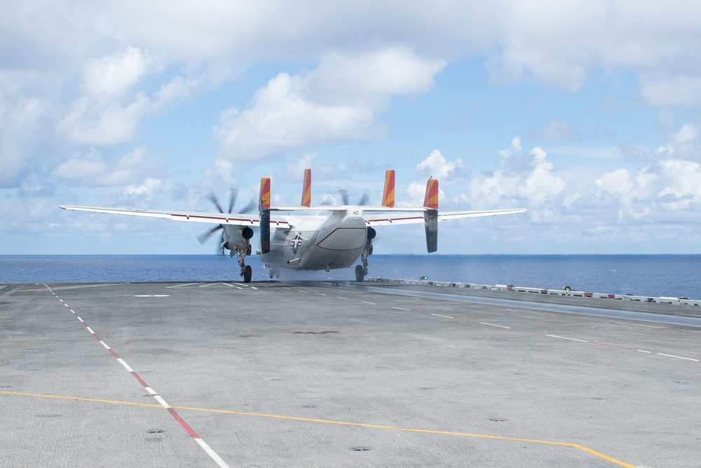 A C-2A Greyhound, assigned to Fleet Logistics Combat Support Squadron (VRC) 40, launches from the flight deck