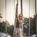 Marine Corps officer candidates conduct a PT led by a Royal Marine