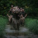 Marine Corps officer candidates compete in the Helmond log race