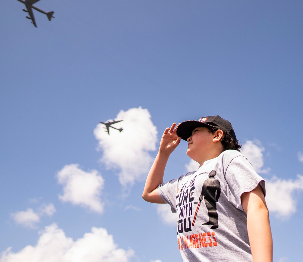 Pilot For a Day Participant Watches Two B-52H Stratofortress' Fly Over