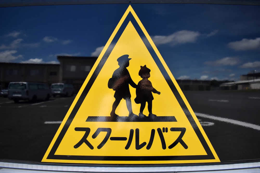 New school buses feature Japanese warning sign
