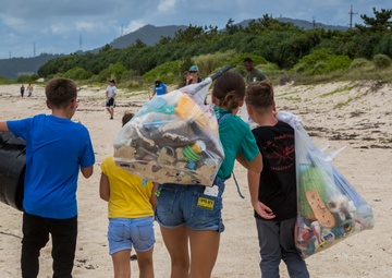 Marines, sailors and children volunteer at Igei Beach cleanup