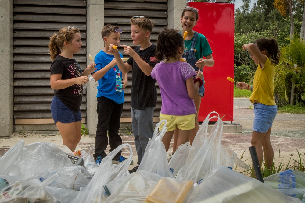 Marines, sailors and children volunteer at Igei Beach cleanup