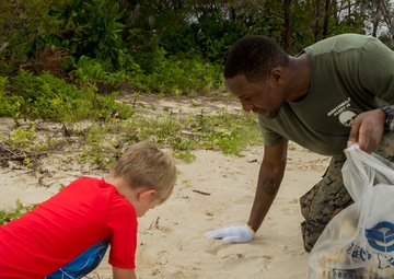 Marines, sailors and children volunteer at Igei Beach cleanup