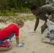 Marines, sailors and children volunteer at Igei Beach cleanup