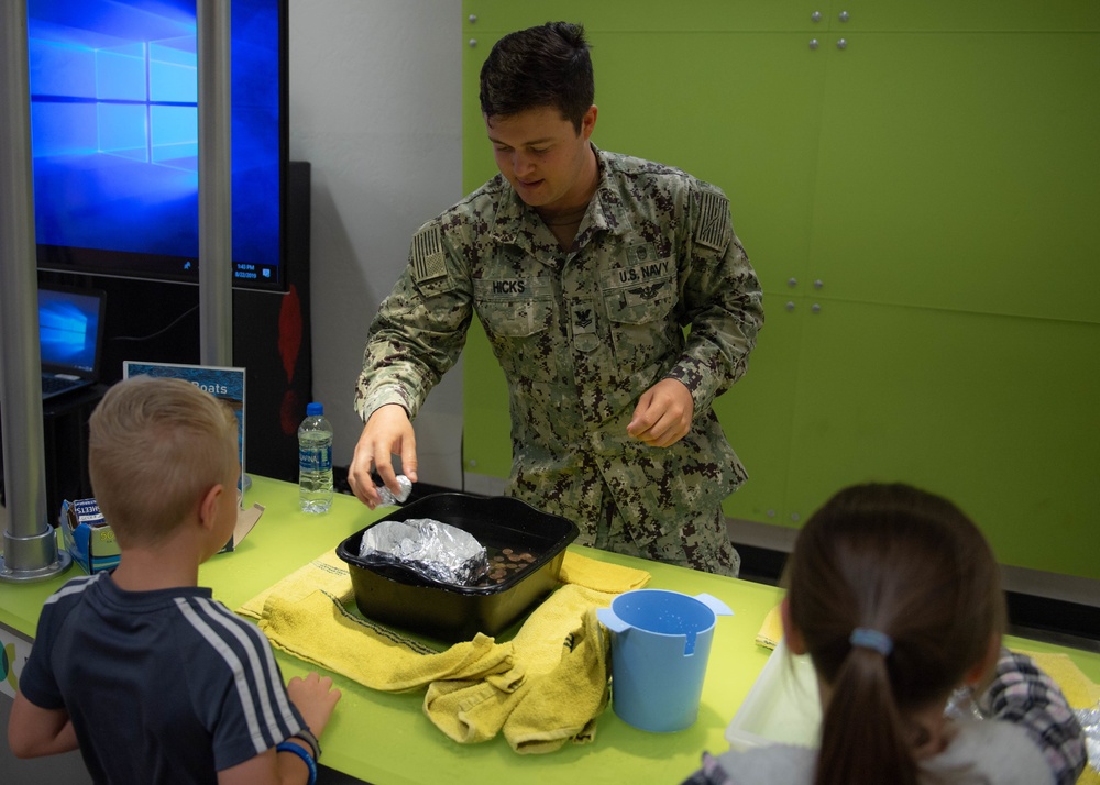 Sailor Interacts with Youth at Discovery Center of Idaho During Boise Navy Week