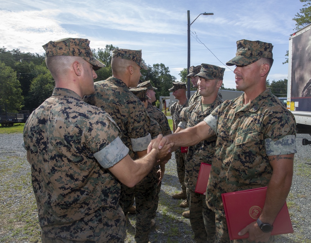 SHOOTING TEAM MEMBERS RECEIVE AWARDS