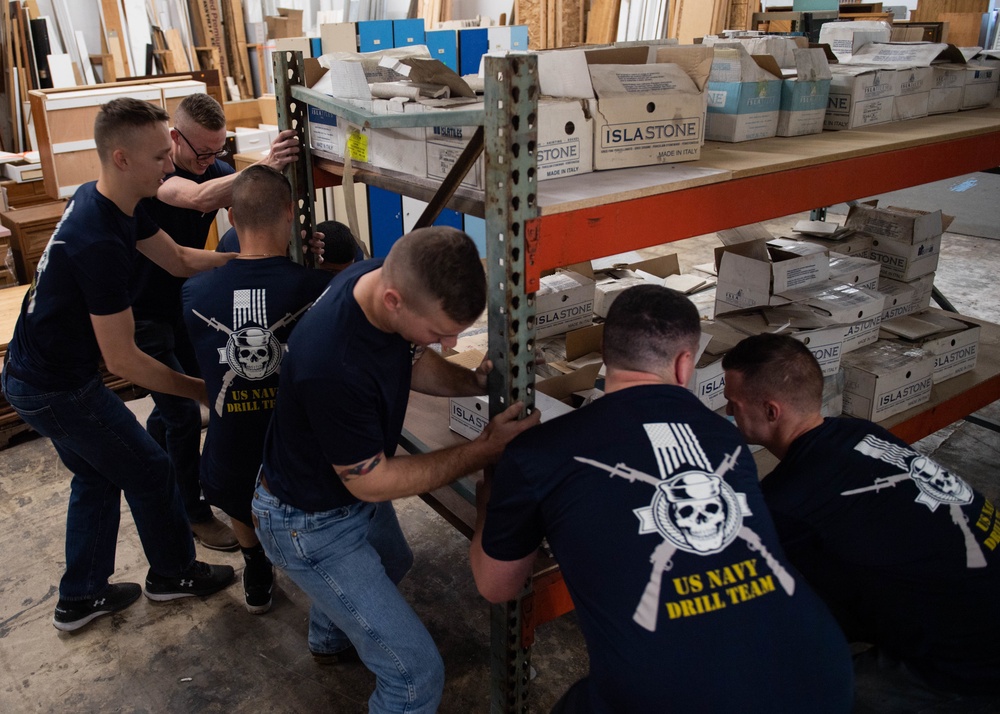 The Navy's Ceremonial Guard Volunteers at Boise Valley Habitat for Humanity ReStore During Boise Navy Week
