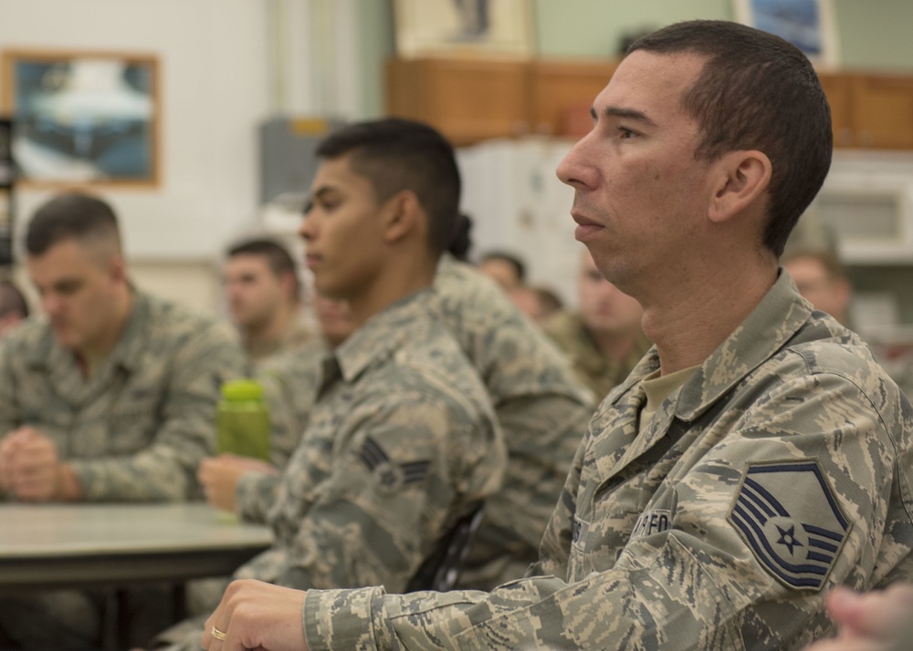 Airmen from the 202nd ISRG get coined at Otis ANGB