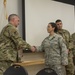 Airmen from the 202nd ISRG get coined at Otis ANGB