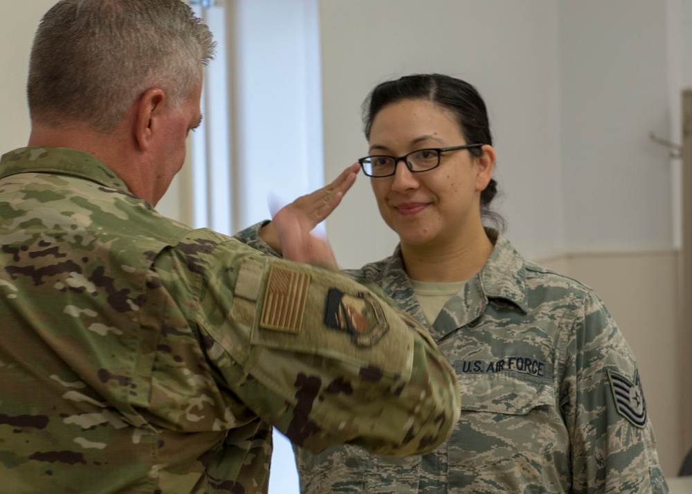 Airmen from the 202nd ISRG get coined at Otis ANGB