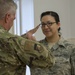 Airmen from the 202nd ISRG get coined at Otis ANGB