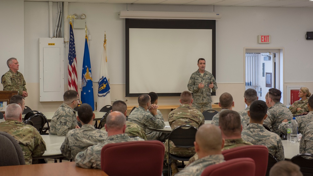 Airmen from the 202nd ISRG get coined at Otis ANGB