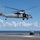 U.S. Sailors assigned to Helicopter Sea Combat Squadron (HSC) 9, conduct a vertical replenishment-at-sea exercise with an MH-60S Sea Hawk