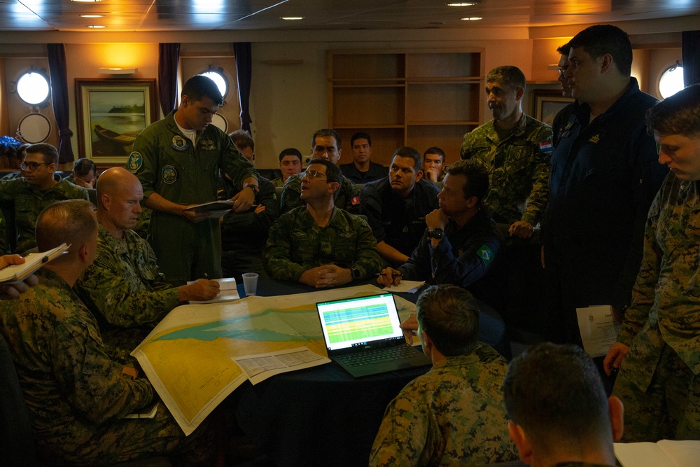 US Marines, partner nation militaries hold planning conference aboard Brazilian navy vessel during multinational exercise