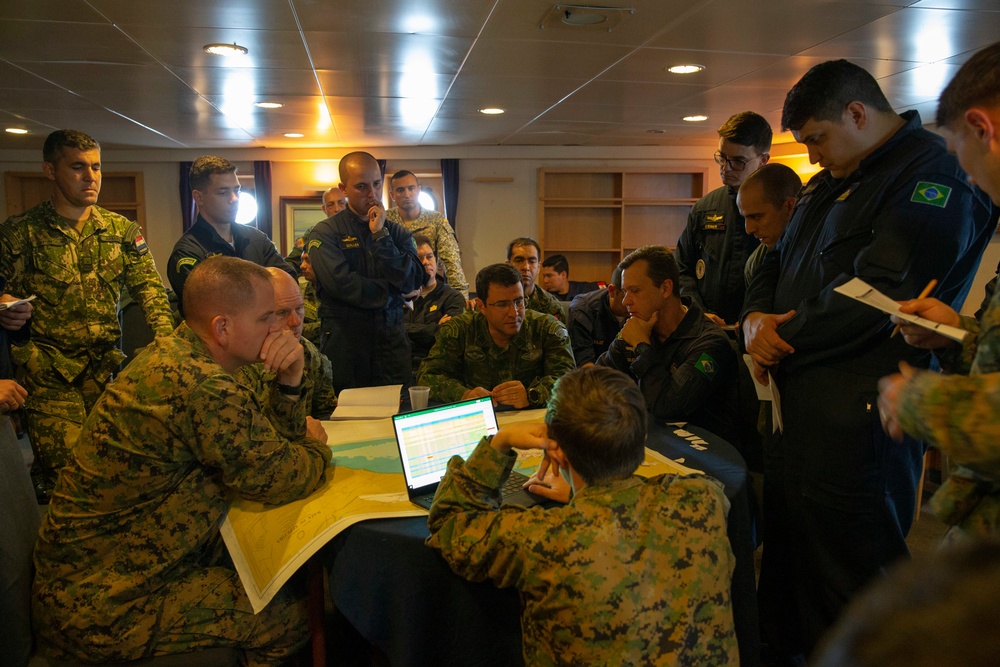 US Marines, partner nation militaries hold planning conference aboard Brazilian navy vessel during multinational exercise