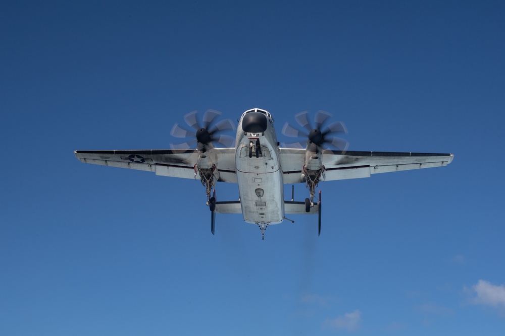 C-2 Greyhound approches the John C. Stennis