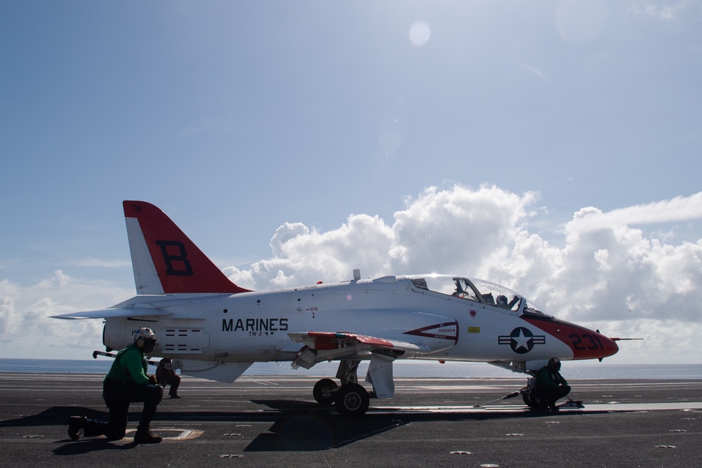 A T-45C Goshawk training aircraft, assigned to Training Air Wing (TW) 2, sits chalked, and chained on the flight deck