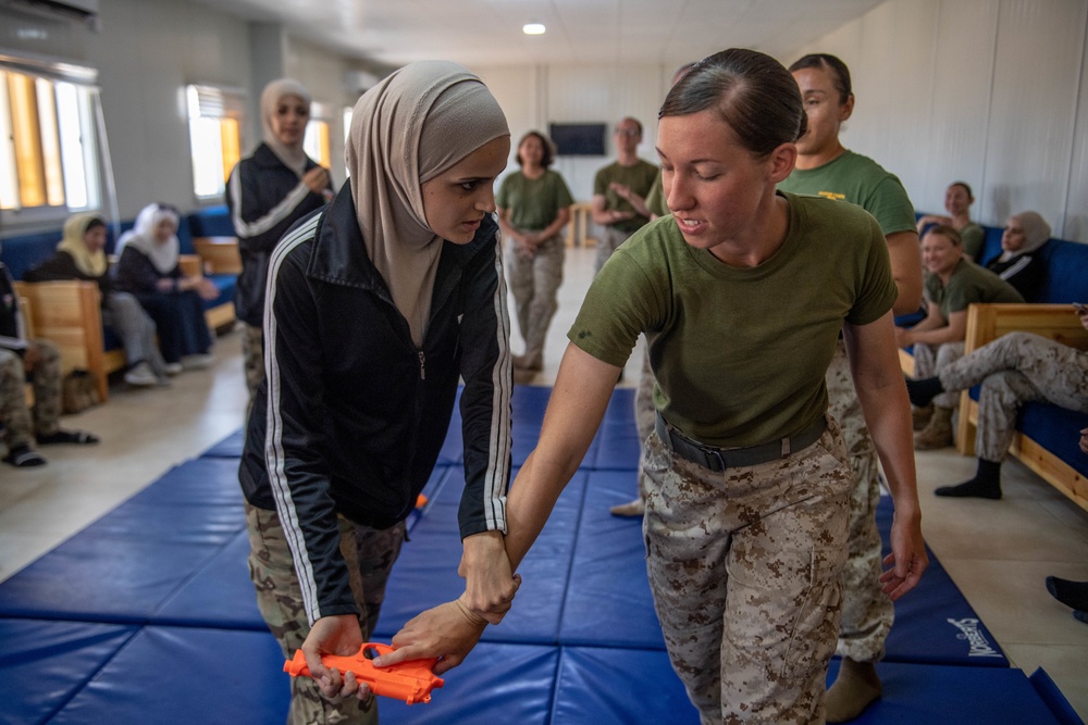 11TH MEU FET Conducts A Marine Corps Martial Arts Program Training Session with the Jordan Armed Forces Quick Reaction Force Female Engagement Team