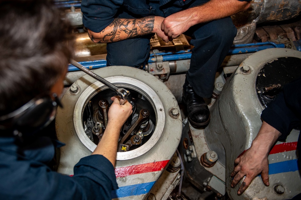 U.S. Navy Sailor Conducts Maintenance