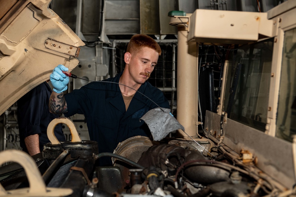 U.S. Navy Sailor Conducts Maintenance