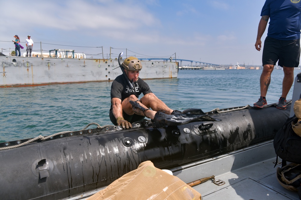 Navy Diver Launches into Water