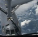 KC-135 delivers fuel to a B-52