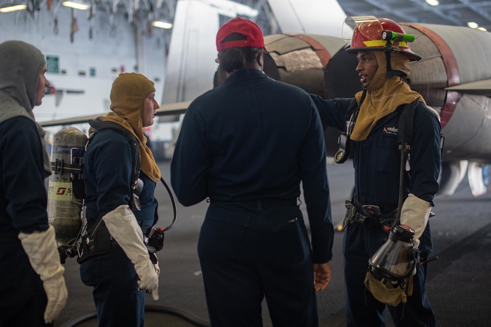 U.S. Sailors conduct a damage control drill