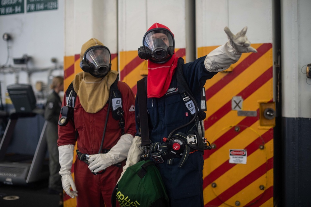 U.S. Sailors conduct a damage control drill