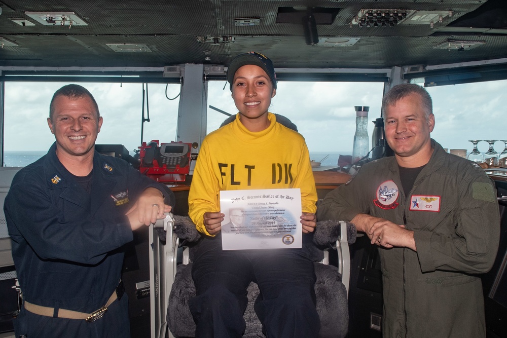 U.S. Sailors pose for a photo