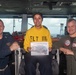 U.S. Sailors pose for a photo