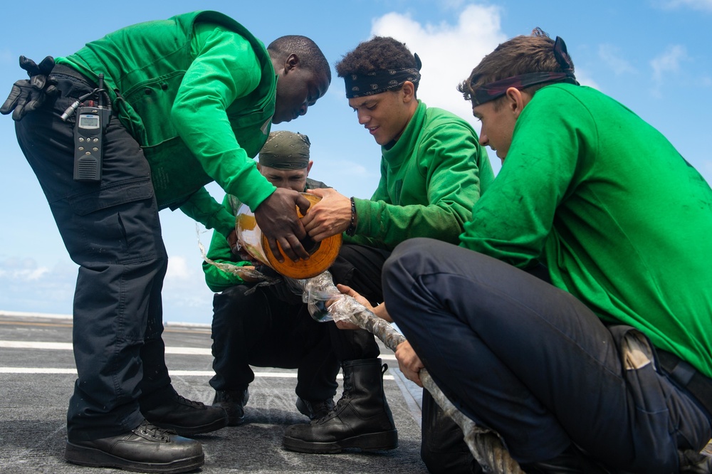 U.S. Navy Sailors conduct preventative maintenance