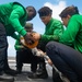 U.S. Navy Sailors conduct preventative maintenance