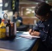 U.S. Sailor tallies ballots