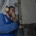 U.S. Sailor uses a sound-powered phone