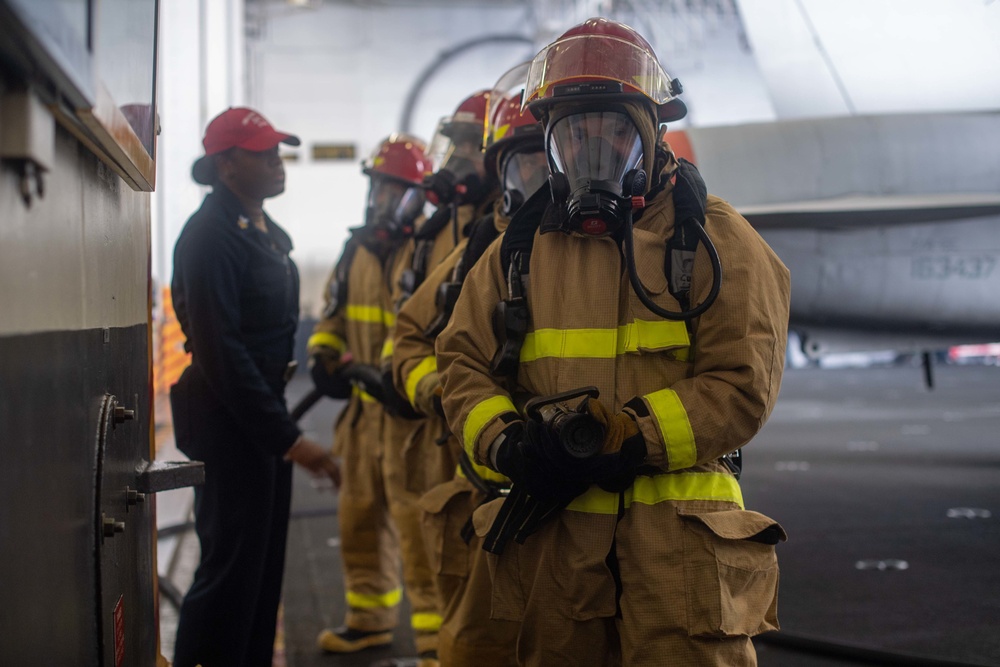 U.S. Sailors conduct a damage control drill