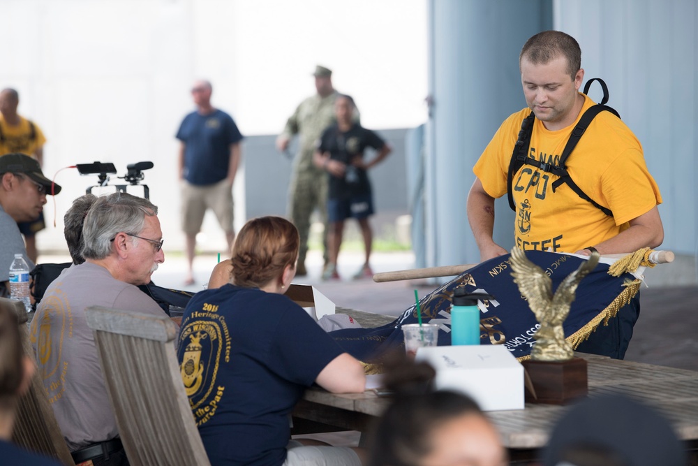 USS Tortuga CPO Selects compete in cadence and guidon competition