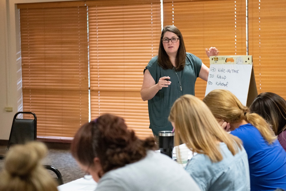 Workshop Empowers 97 AMW Spouses with Their Purpose