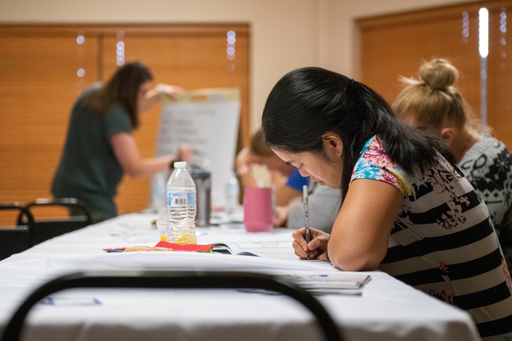 Workshop Empowers 97 AMW Spouses with Their Purpose