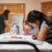 Workshop Empowers 97 AMW Spouses with Their Purpose