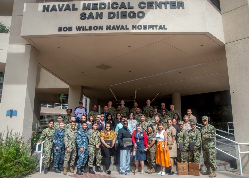 Volunteers pose for photo